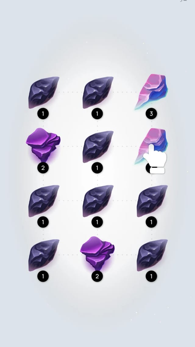Gem 11 gameplay after several merges, with two multicoloured 3 gems in the right column and the score counter showing 5