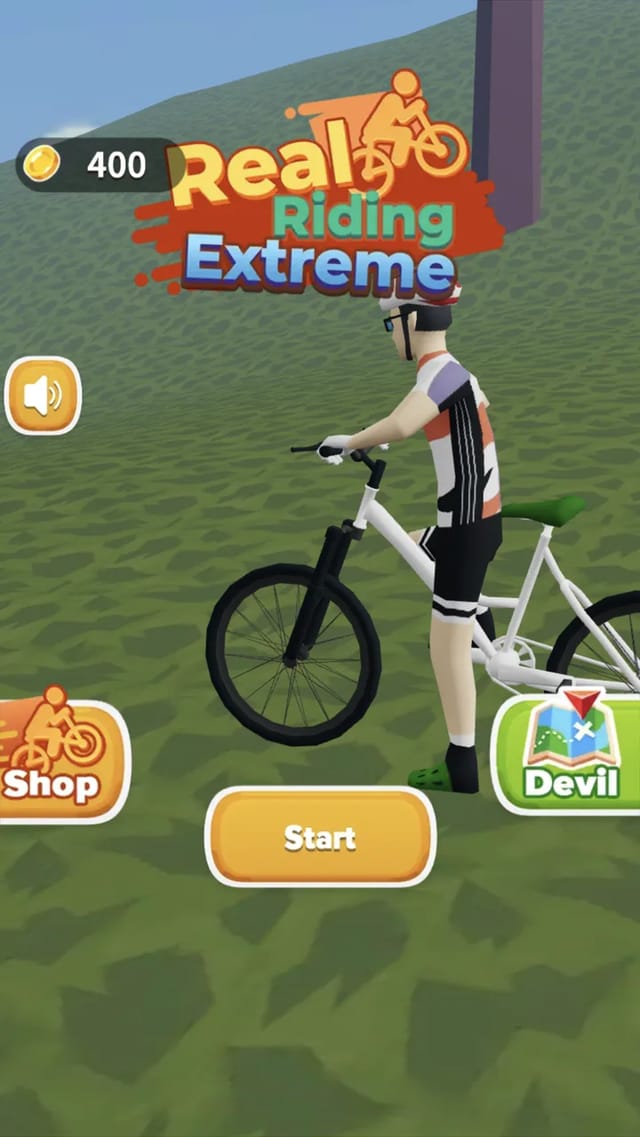 Real Riding Extreme home screen showing a helmeted rider standing with a white BMX bike on a grassy hill under the game logo, with Shop, Devil and Start buttons and a coin counter
