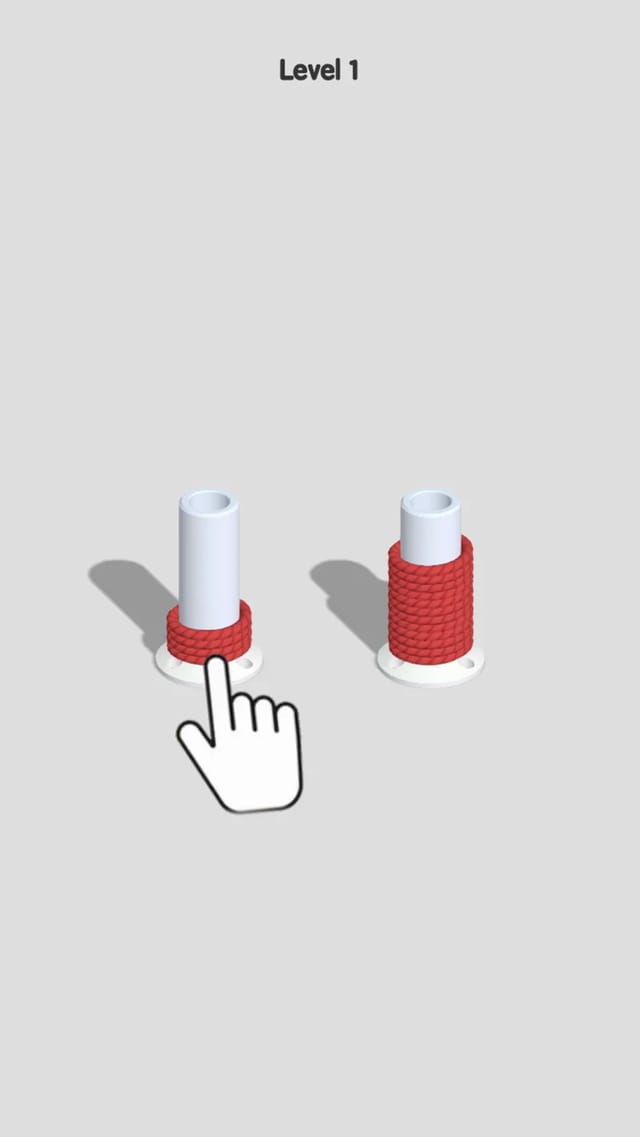 Rope Sort opening level showing two white 3D spools on a grey stage wound with red rope coils, a tutorial hand pointing at the left spool and a Level 1 label above