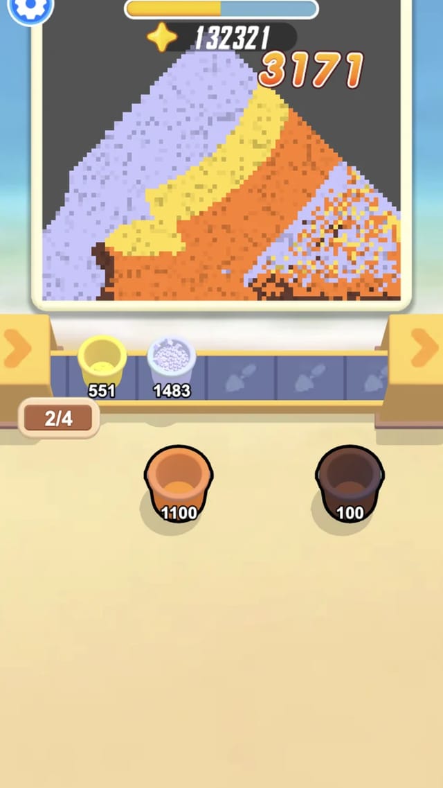 Sandy Jam mid-game with a partially collapsed sand pile and two buckets filling on the conveyor
