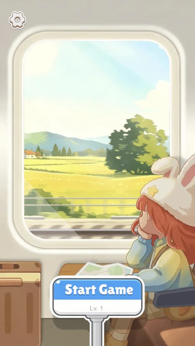 Tasty Tile Travel home screen: a girl in a bunny-ear hat gazing out of a train window at the passing scenery beside the Start Game sign